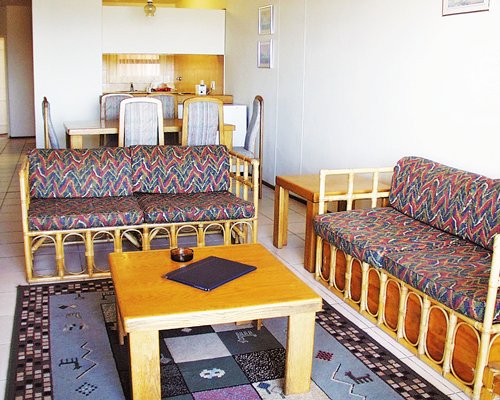 A living area alongside dining and kitchen.