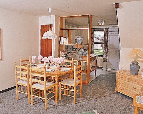 A well equipped kitchen with dining area.