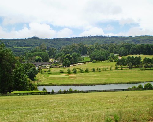 Scenic view of Troutbeck Inn resort property alongside the water.