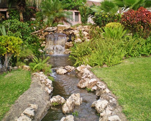 A stream running through landscaping.