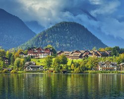An exterior view of the resort properties alongside the lake.