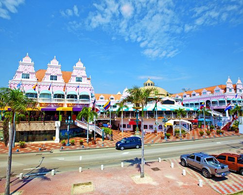 Street view of Costa Linda Beach Resort with parking lot.