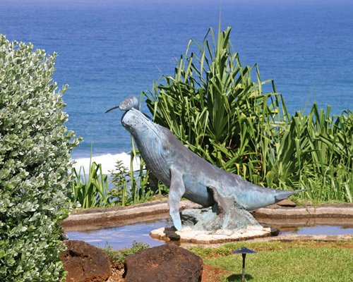 A statue alongside the ocean.