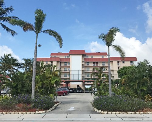 A street view of the Windward Passage Resort with the parking.