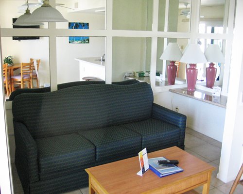 A well furnished living room and dining area.