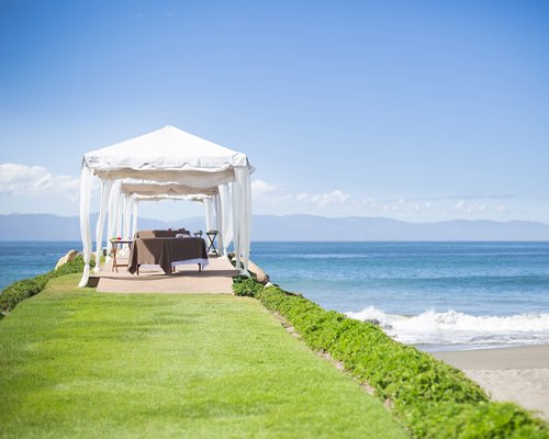 Lawn with a Private dining area alongside the beach.