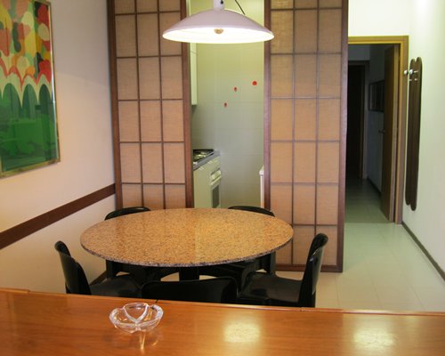An open plan dining area alongside the kitchen.