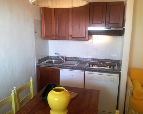 An open plan dining and kitchen area.