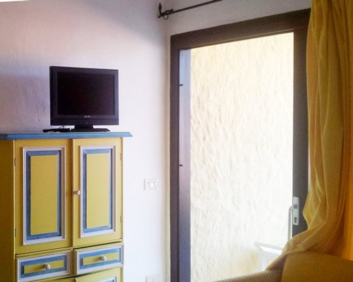 Furnished living room with a television.