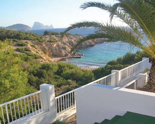 A balcony view of the coastal area of ocean.