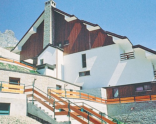 An exterior view of the resort with staircase.