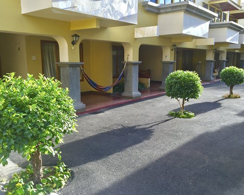 A ground view of the Taranova Villas Palmas resort balcony.