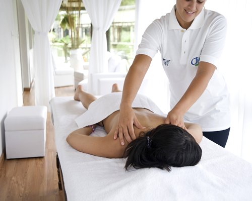 A woman enjoying the massage.