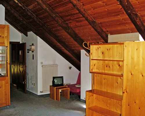 A well furnished living room with a television.