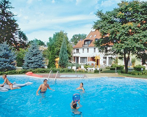 An outdoor swimming pool alongside the resort.