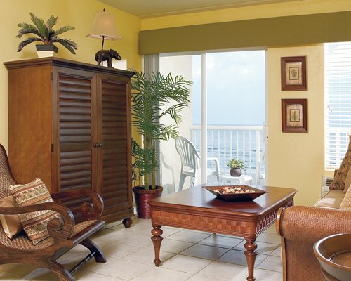 A well furnished living room with a balcony.