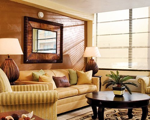 A well furnished living room with outside view.