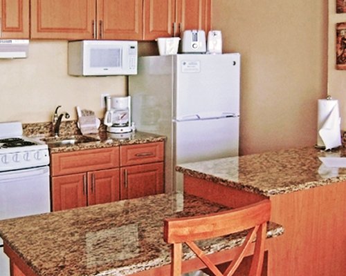 An open plan kitchen with a dining area.