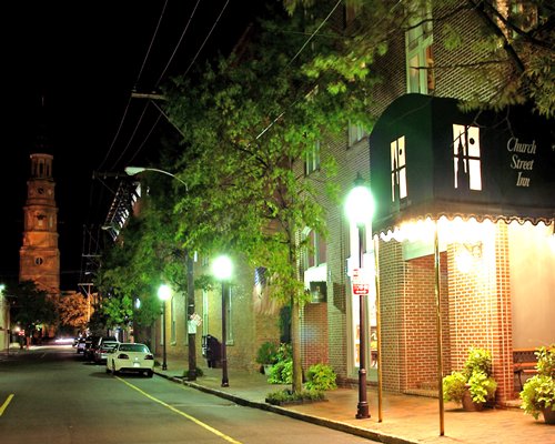 Street view of the Church Street Inn resort at night.