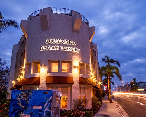 An exterior view of the Coronado Beach Resort alongside the street.
