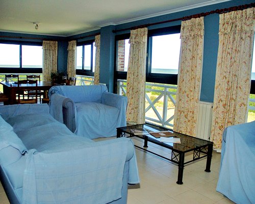 An open plan living and dining area with an outside view.