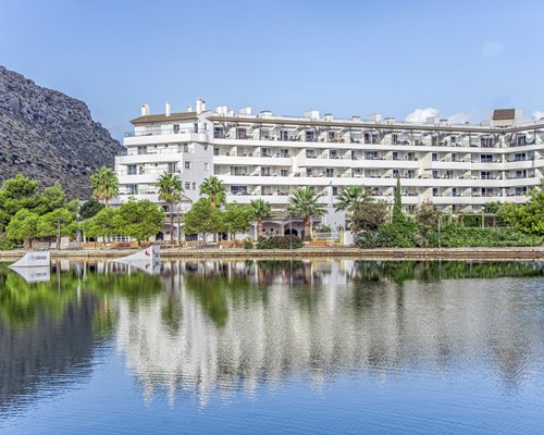 Exterior view of Garden Lago with multiple unit balconies.