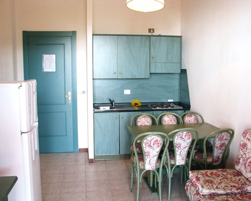 An open plan dining and kitchen area.