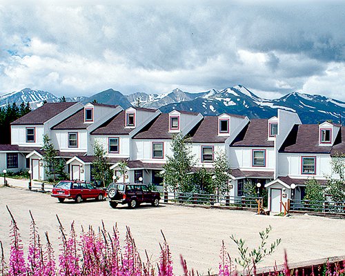 Scenic exterior view of Royal Holiday Club Rockridge I and II with parking lot during winter.
