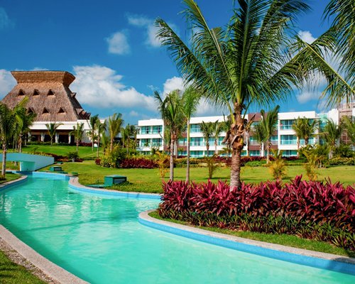 An outdoor pool alongside the resort.