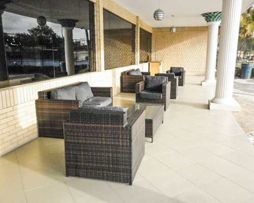 A well furnished outdoor lounge area.