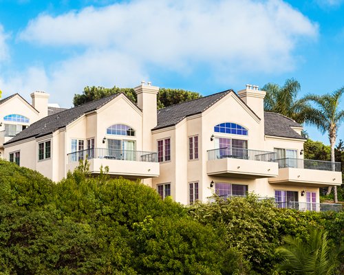 Exterior view of multiple unit balconies at Villa L'Auberge.