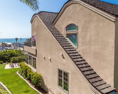 Scenic view of a unit at Villa L'Auberge with patio furniture.