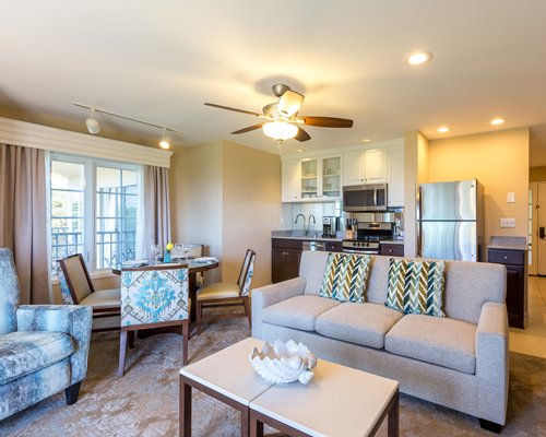 An open plan living dining and kitchen area.