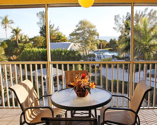 A view of patio furniture on a balcony.