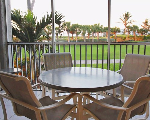 Balcony with a patio furniture and an outside view.