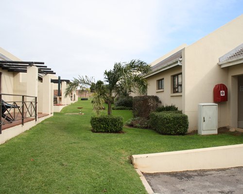 Scenic view of condos with patios at Sunshine Bay Beach Club.