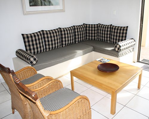 A well furnished living room with double pull out sofa.