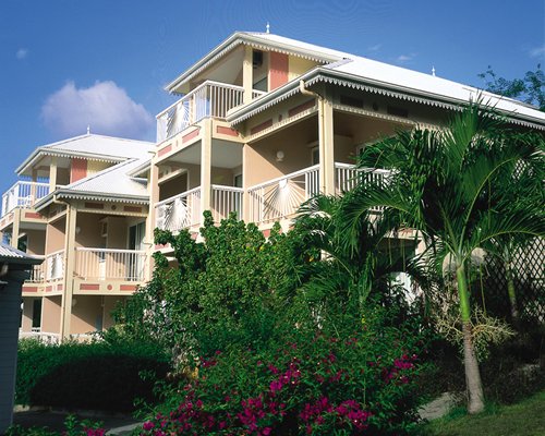 Scenic exterior view of multiple unit balconies at Diamant Beach Club.