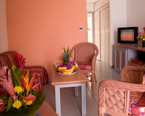 A well furnished living room with television.