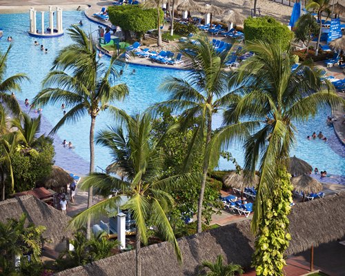 An aerial view of the MVC at Melia Puerto Vallarta resort alongside a swimming pool.