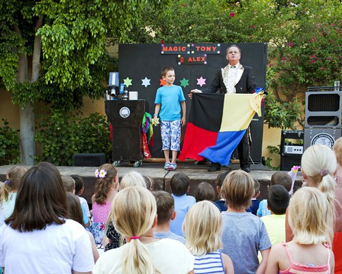 View of magic show for kids at Candia Park Village.