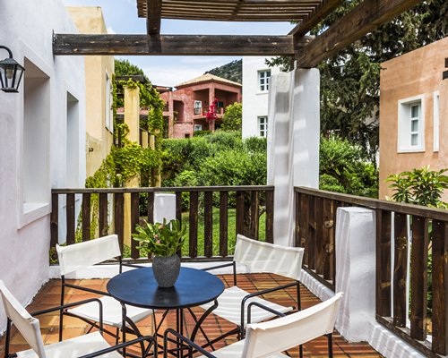 Outdoor patio with patio furniture surrounded.