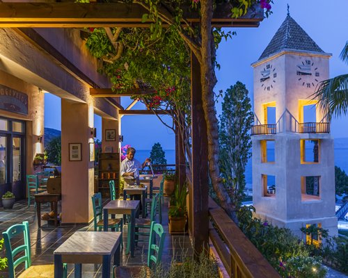 Restaurant with a view of a clock tower at Candia Park Village.