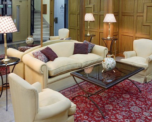 A well furnished living room with sofas.