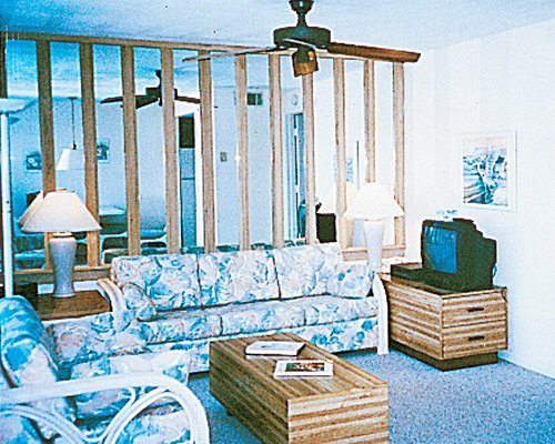 A well furnished living room with television.