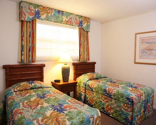 A Well furnished bedroom with two beds.