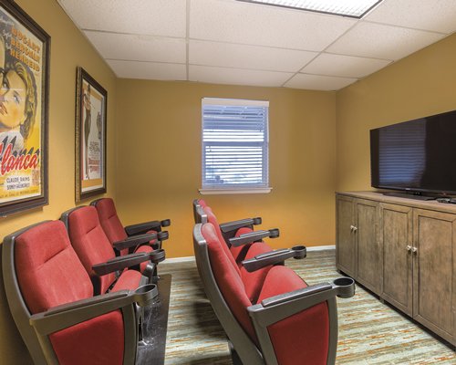 Indoor conference room with a television.