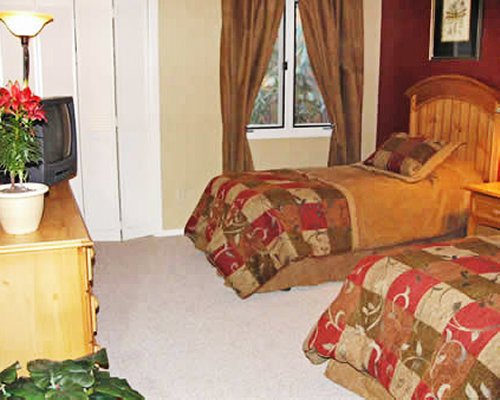 A bedroom with television.