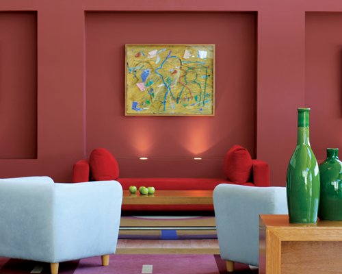 Indoor lounge area at Hotel NH Columbia.