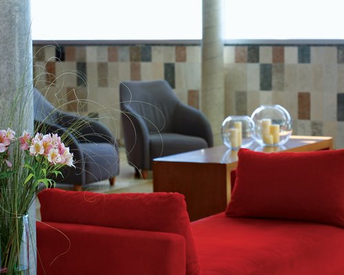 Outdoor lounge area at Hotel NH Columbia.